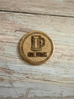 Valley Laserworks wooden beer token, engraved with a beer mug and "ONE DRINK" text.